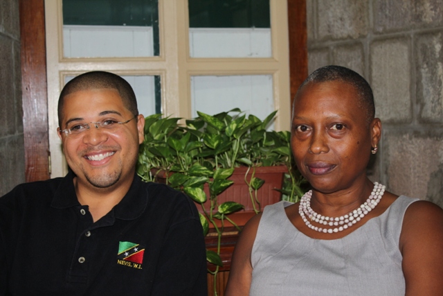 Michael Henville who is spearheading the new C40 Energy Drink Competition for the Culturama 40 festivities and Chairperson of the Culturama 40 Central Committee Deborah Tyrell at the Department of Information on June 12, 2014